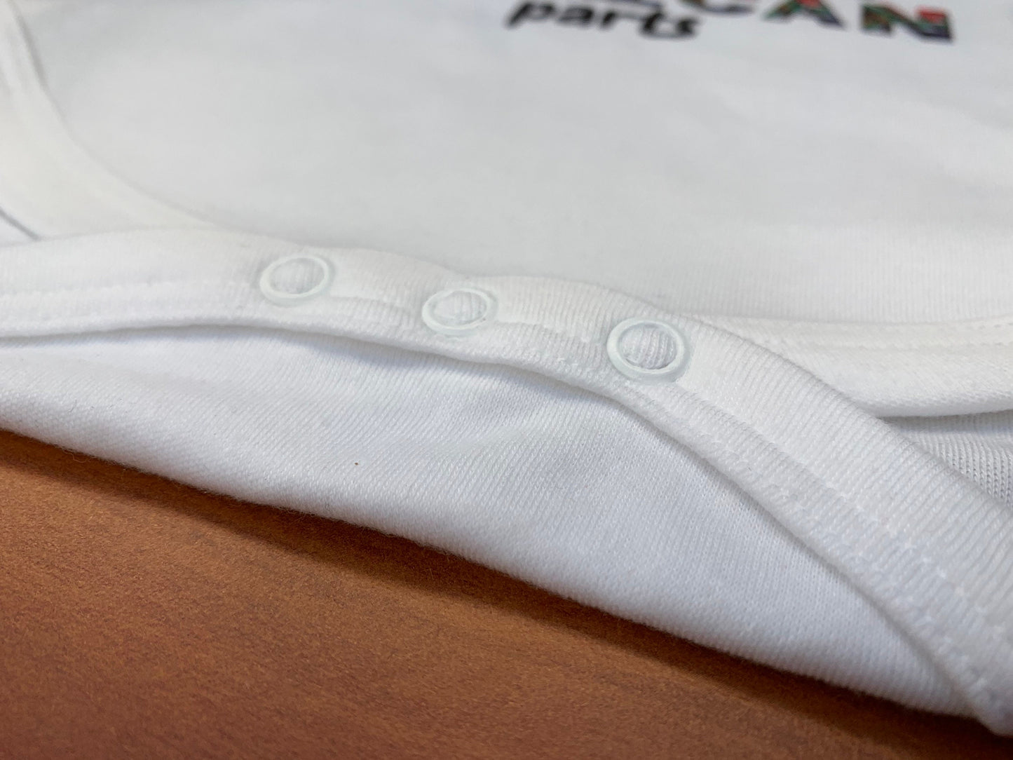 Made in Britain with Gambian parts Baby-grow / vest ( Made to order )