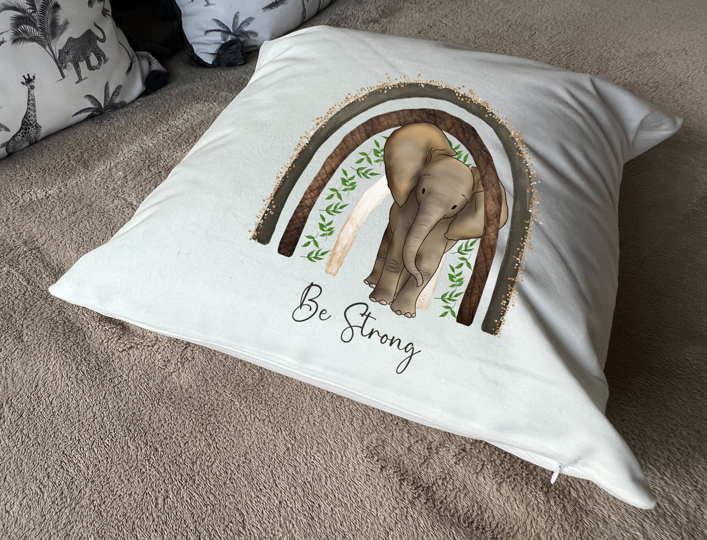 Elephant 'Be Strong' plush white deluxe scatter cushion. Vibrant hand printed design.
