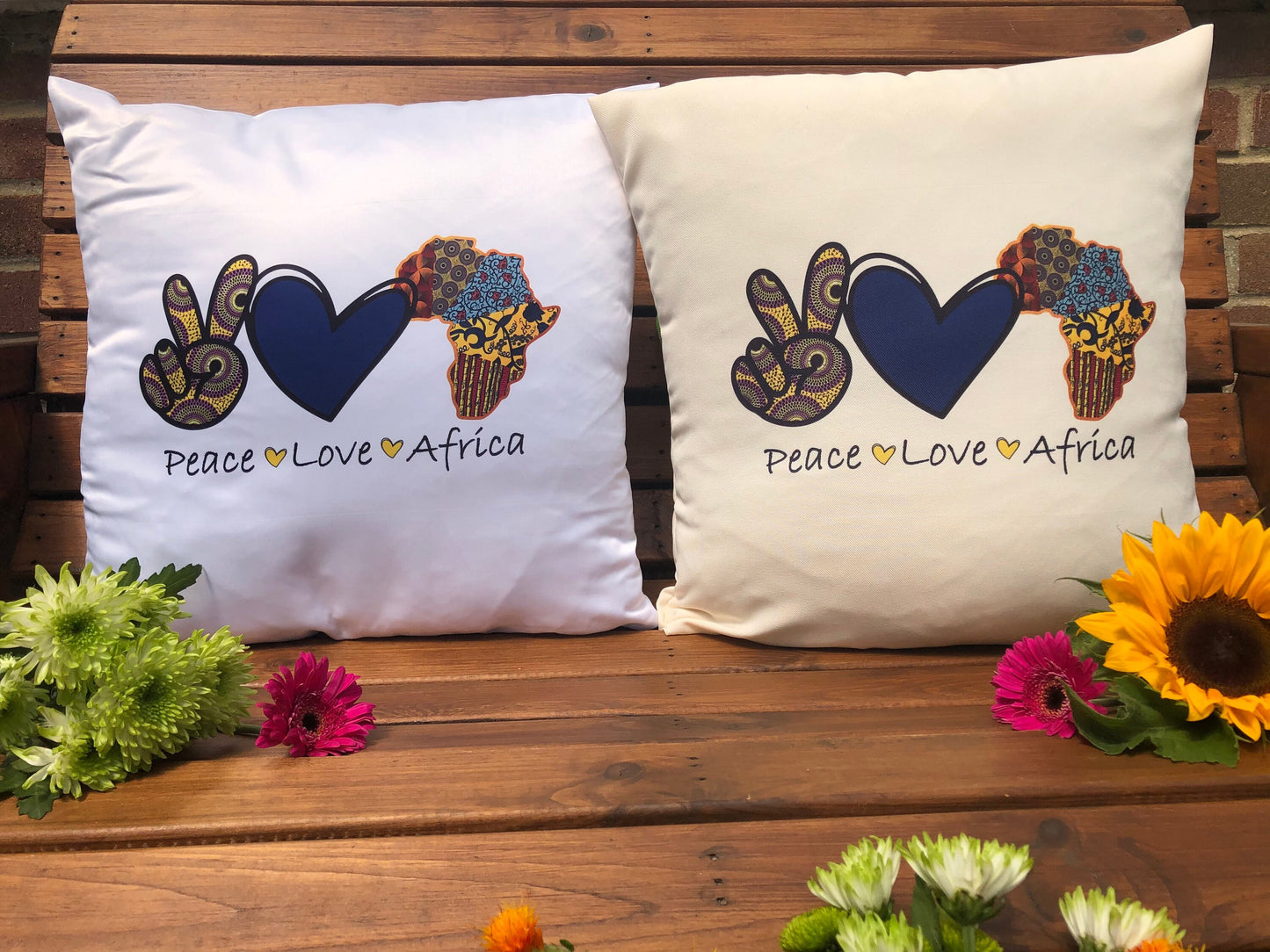 Cushion cover with a unique “Peace Love Africa” design. Plush white deluxe 'soft feel' scatter cushion. ( 40x40cm )