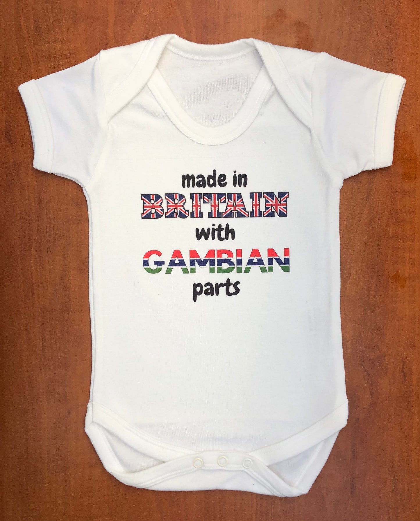 Made in Britain with Gambian parts Baby-grow / vest  ( Made to order )