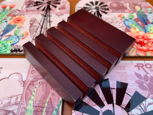 Mahogany stained display stand for 4 coasters.