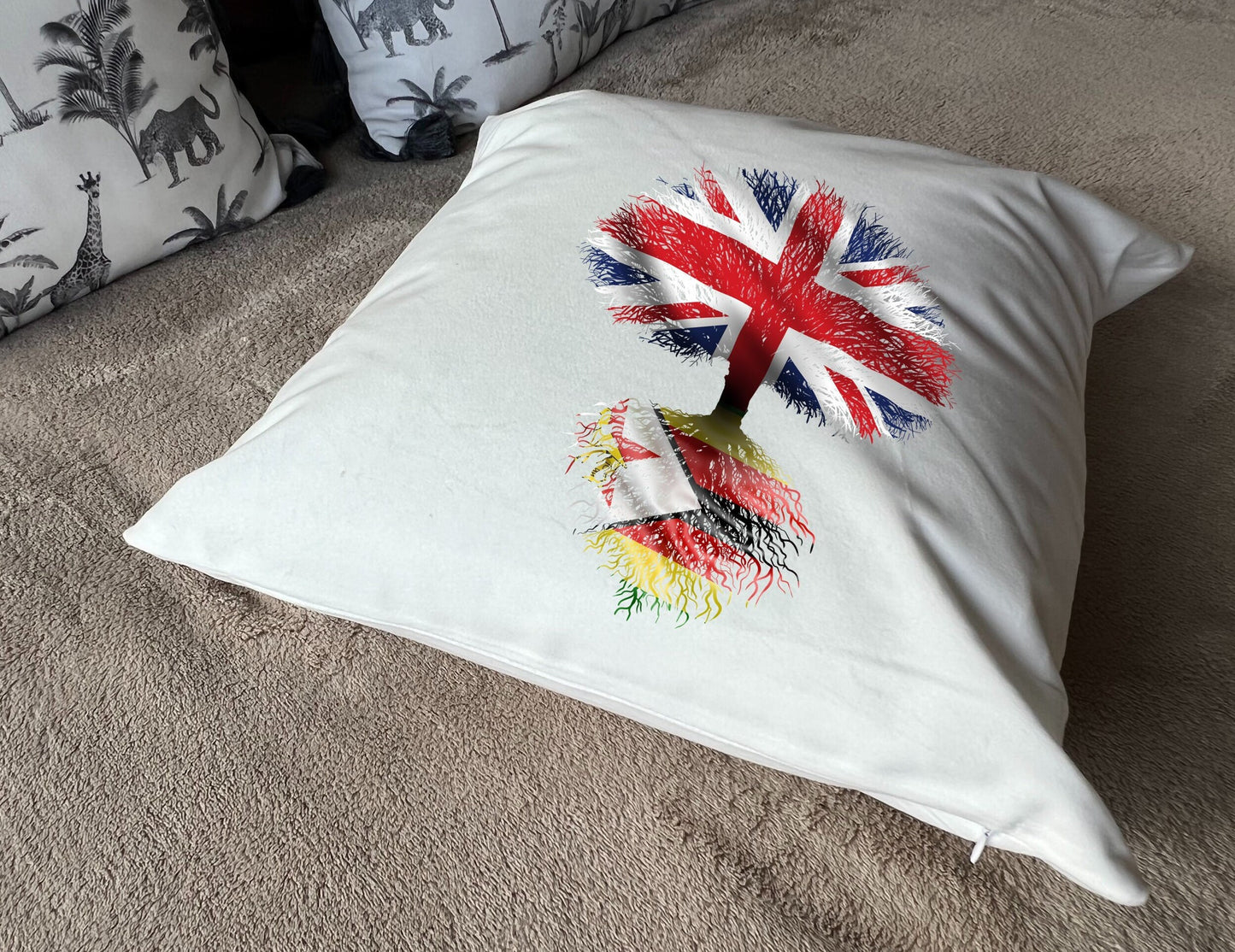 Zimbabwe heritage cushion United Kingdom flag tree with Zimbabwean flag roots. Plush white cushion, ideal gift.