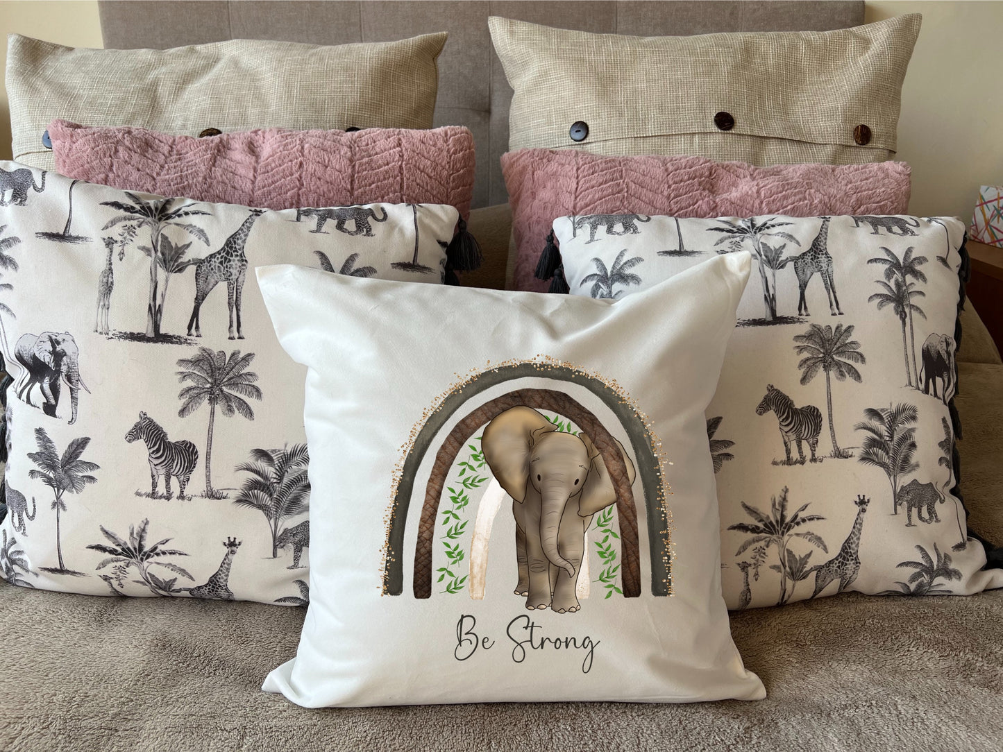 Elephant 'Be Strong' plush white deluxe scatter cushion. Vibrant hand printed design.