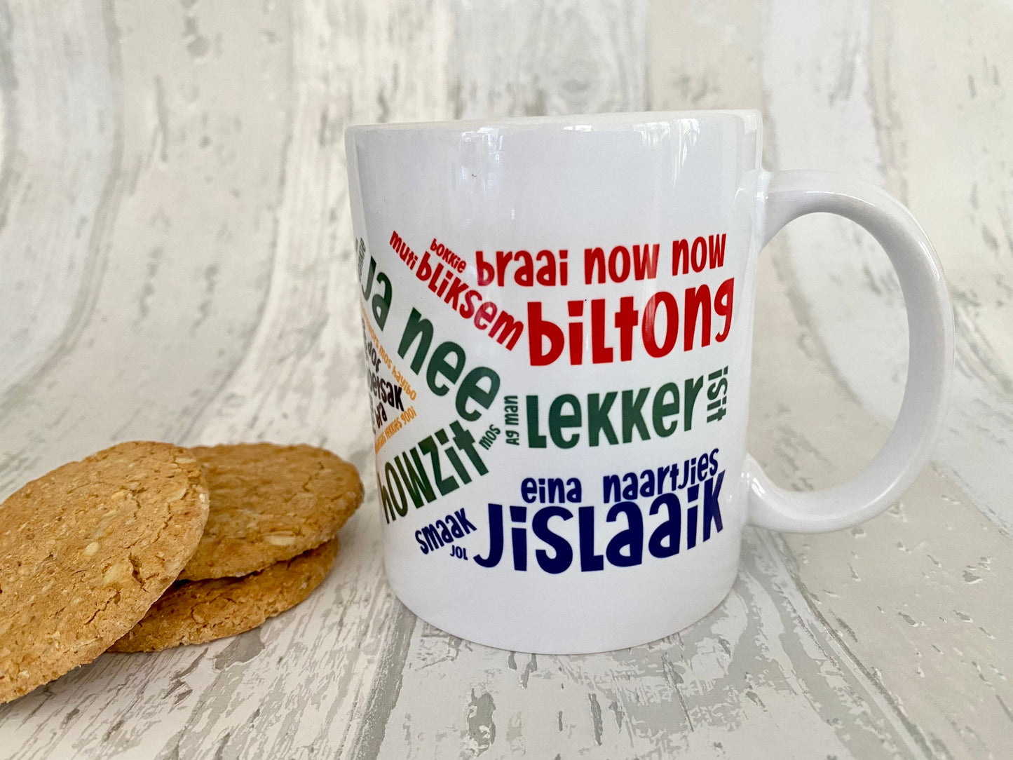 South African slang sayings in the South African flag 11oz mug. Afrikaans slang. SAFFA mug. Flag Art.