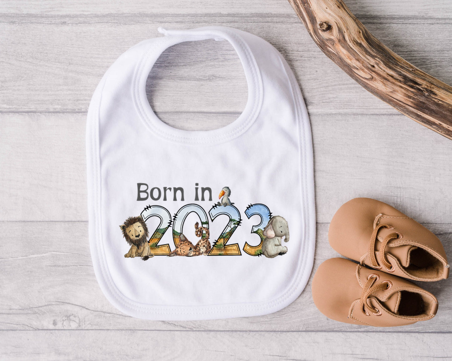 Baby Bib. Born in 2023 safari animal design. New baby gift. Pregnancy Announcement. Gender neutral baby gift. Boy or Girl baby gift.