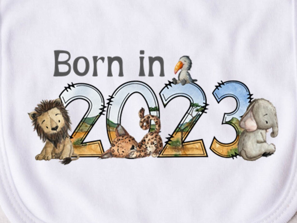 Baby Bib. Born in 2023 safari animal design. New baby gift. Pregnancy Announcement. Gender neutral baby gift. Boy or Girl baby gift.