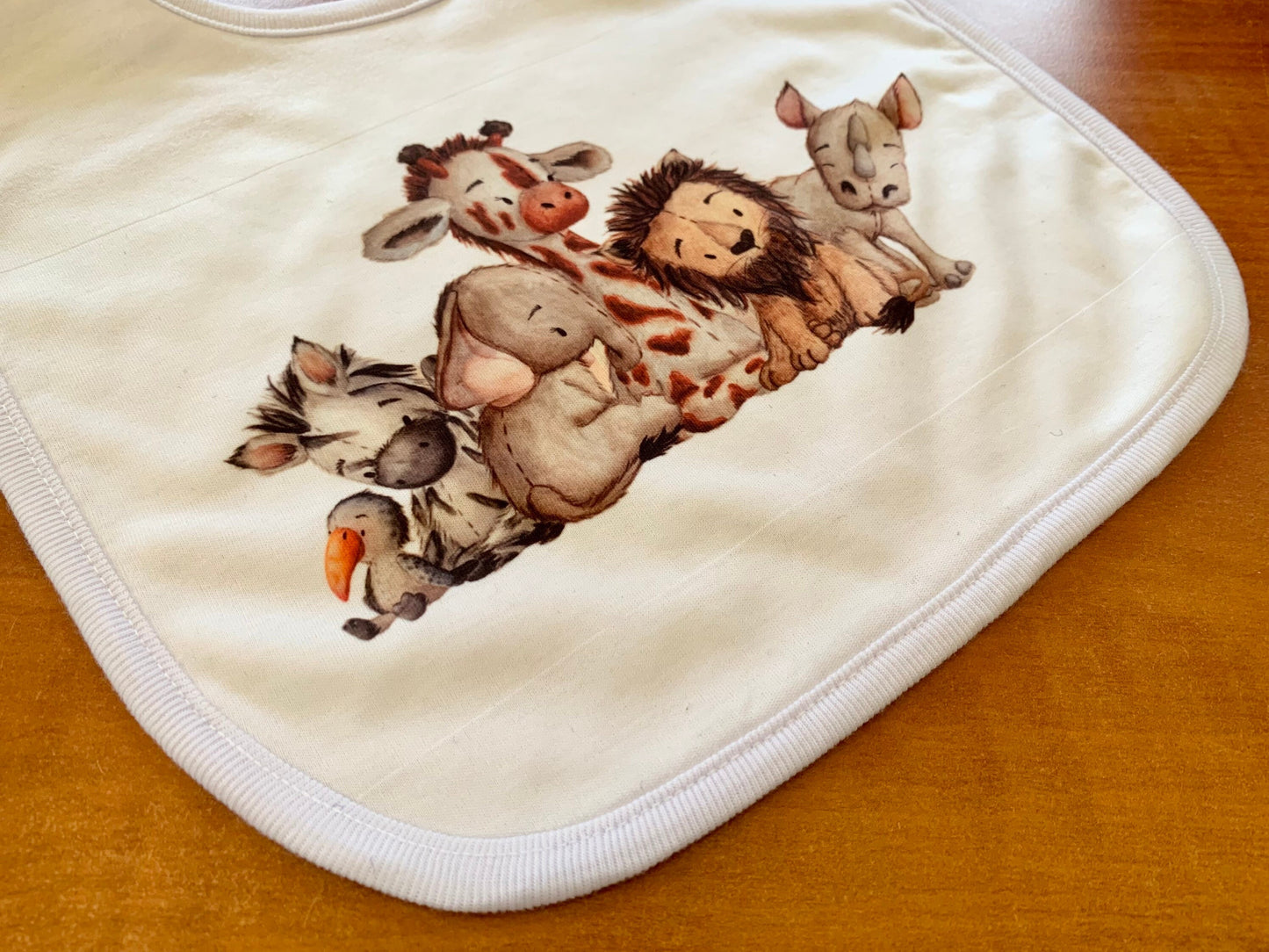 Baby Safari Animals bib. New baby gift. Pregnancy Announcement. Lion Giraffe Elephant Zebra. Gender neutral Baby Gift.