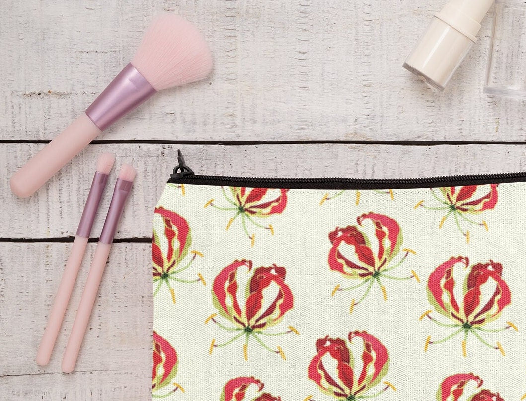 Flame Lily Cosmetics / pencil case. Gloriosa superba Zimbabwe. Brightly coloured Flame Lily printed on a linen cosmetics case.