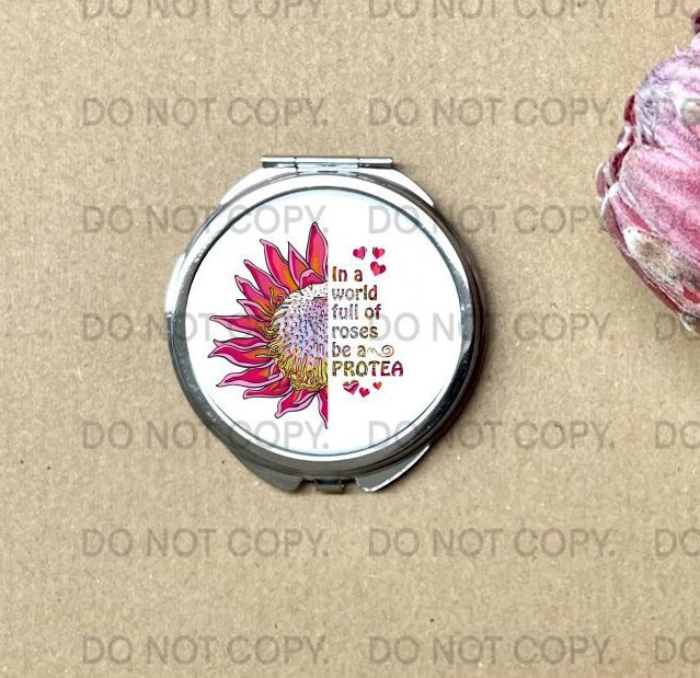 Small hand bag mirror with the motivational quote " In a world full of roses be a protea" Pink protea flower Inspirational Birthday gift